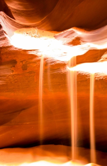 Sand Falling in a rock at Antelope Canyon